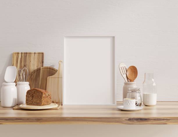istock Mock up poster frame in kitchen interior with white wall on wood shelf. 1402551715