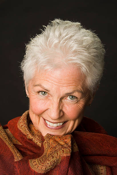 60ish Caucasian Woman Smiling stock photo
