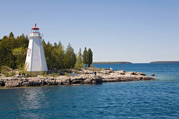 istock tobermory view from boat to island and lighthouse 140255476