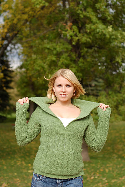 Beautiful young woman outdoors stock photo