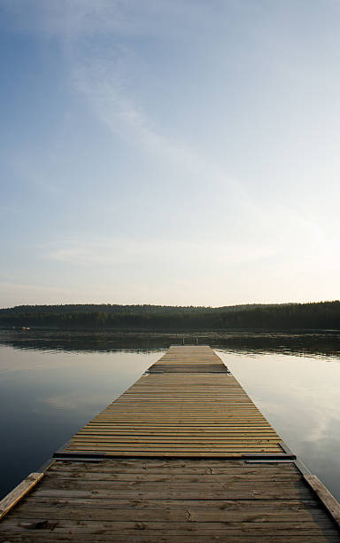 istock Wooden Pier and Still Lake 140256181