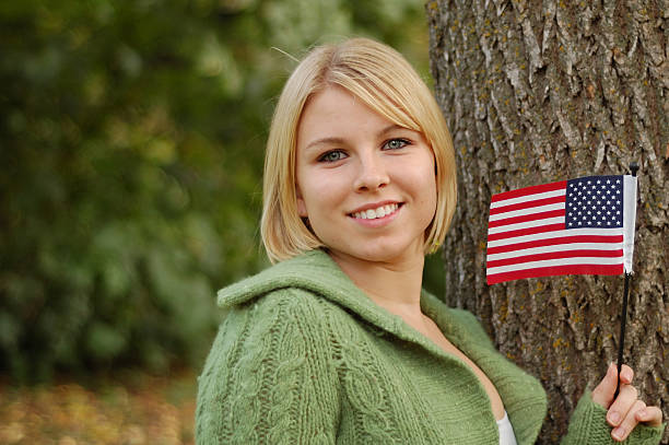 Pretty girl with American flag.