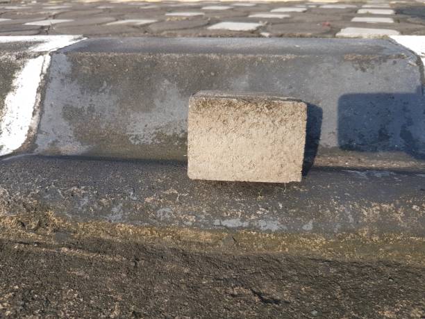 istock a paving block on the road divider 1402566707