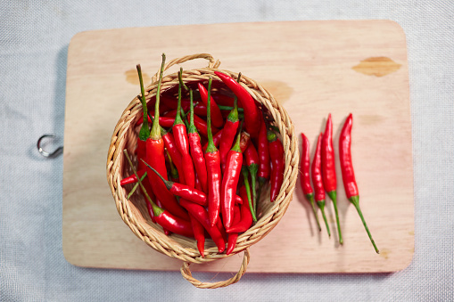Red chilli pepper in a wicker basket