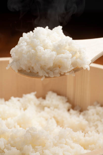 istock Freshly cooked white rice in a rice tub 1402567656