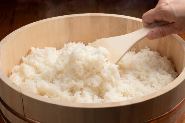 istock Freshly cooked white rice in a rice tub 1402567662
