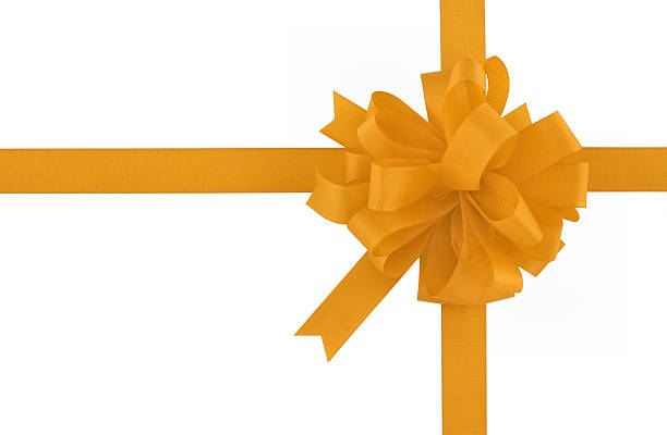 istock yellow bow and ribbon on pure white background 140256767
