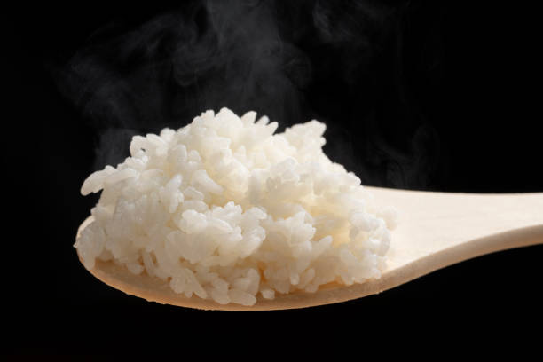 istock Freshly cooked white rice in a rice tub 1402567672