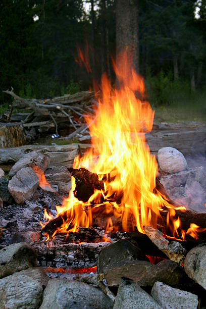 campfire at twilight stock photo