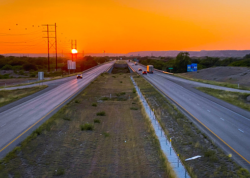 Sun setting over interstate 10 in Texas