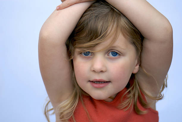 istock Young Girl smiling on light background 140257696