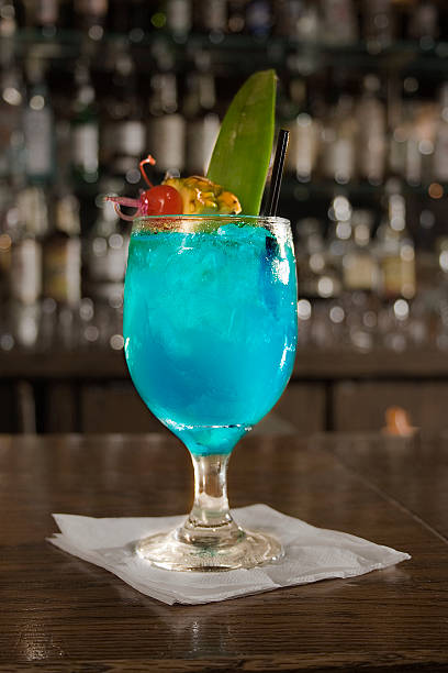 Blue Hawaiian Tropical Drinks at a bar.blue hawaiian blue hawaiian stock pictures, royalty-free photos & images