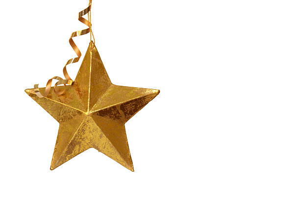 istock A single golden Christmas star isolated on white background 140258261