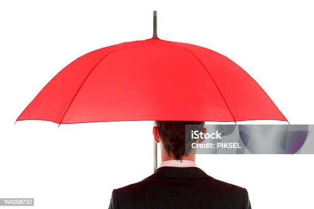 Photo libre de droit de Homme Daffaires Tenant Un Parapluie banque d'images et plus d'images libres de droit de Adulte - Adulte, Affaires, Costume habillé