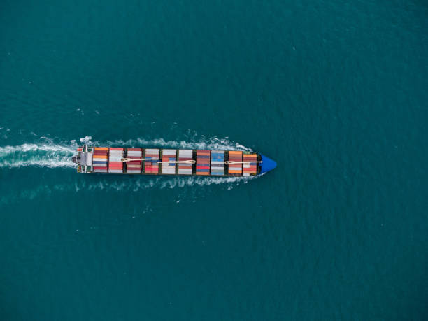 istock Aerial view of cargo container ship in the sea 1402588773