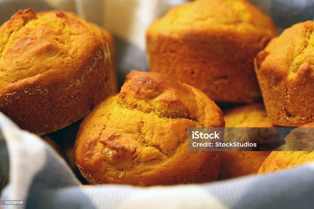 Pumpkin Muffins in a Basket pumpkin muffins in a basket Bread Stock Photo