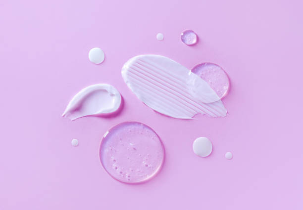 istock cosmetic smears cream texture on pastel pink background 1402592474