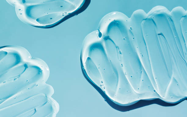 istock texture gel serum on blue background 1402592480