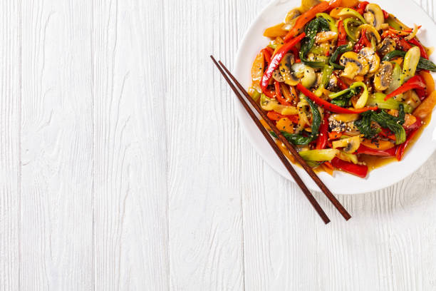 istock Stir Fry Vegetables on white plate, top view 1402594291