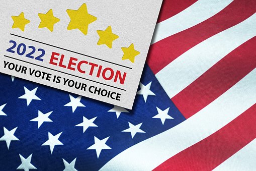 USA Vote. Text VOTE with American flag background. Voting rights and elections 3d illustration.