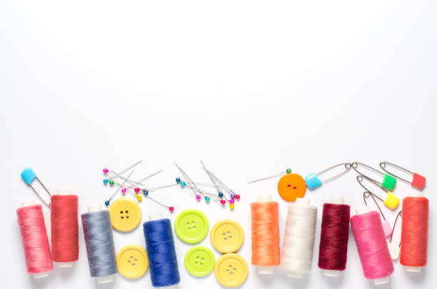 istock Accessories for sewing on a white background. Closeup. Copy space 1402599004