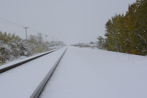 Train tracks during winter in rural Canada - Airdrie, AB