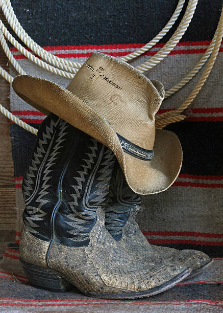 istock A pair of cowboy boots and a cowboy hat 140260099