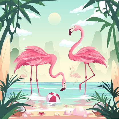 Summer time beach concept. Flamingos catching fish at the seashore