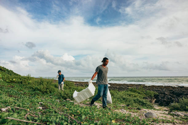 istock Community Volunteer Groups on the Beach 1402604415