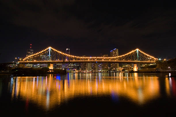 story bridge by night from side stock photo