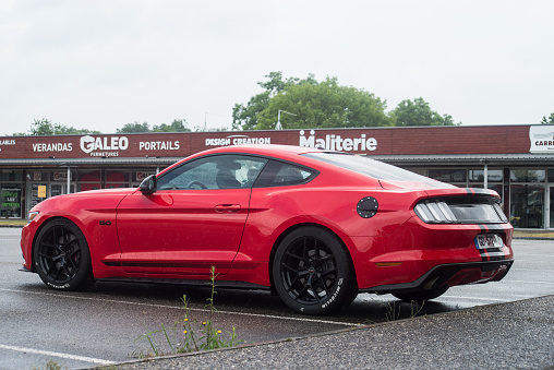 Lutterbach - France - 5 June 2022 - Profile view of red Ford Mustang GT 500  parked in the street