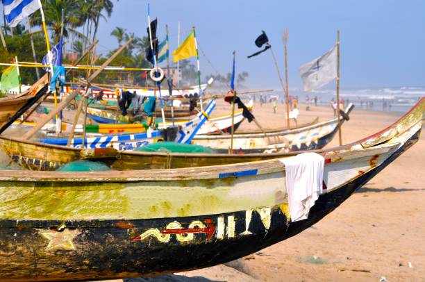 istock Boats Moored On Beach Against Clear Sky 1402608584