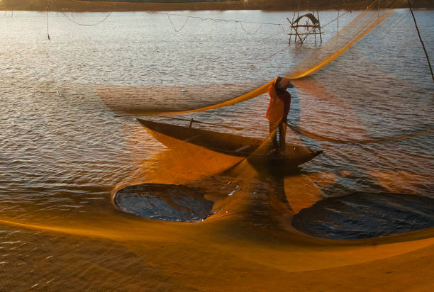 istock Catching fish in Hoi An 1402610842