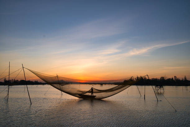 istock Catching fish in Hoi An 1402610852
