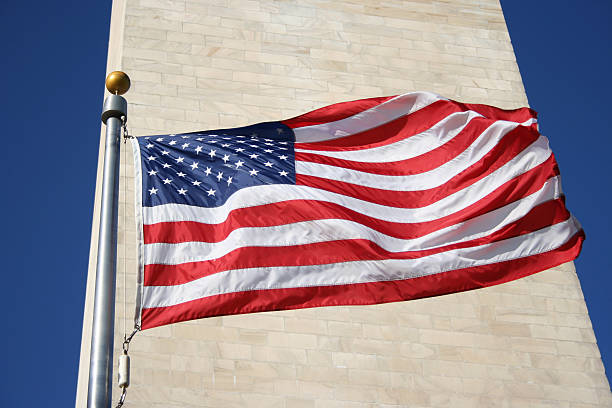 istock American flag and Washington monument 140261239
