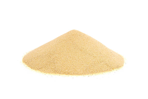 istock Pile of sand isolated on white 1402614209