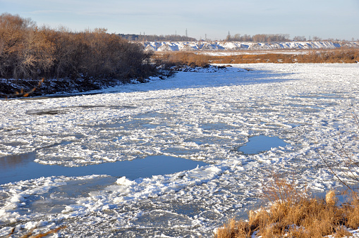 As soon as stable winter frosts are established in the Western Urals, the Ural rivers begin to freeze and are covered with the first sludge ice.