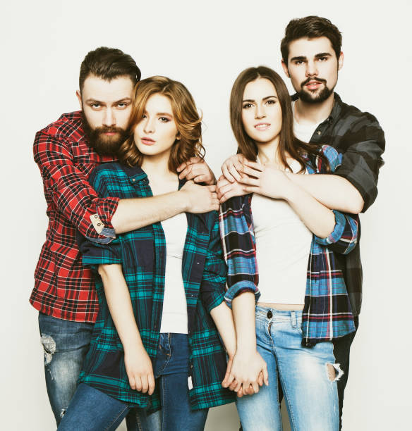 istock group of happy young men and women 1402617721