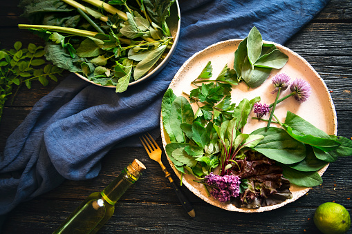 Salad with edible flowers and salad leafs.