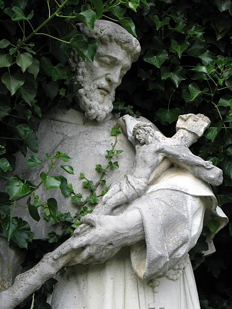 istock Religious Statue in Ivy Garden 140261973
