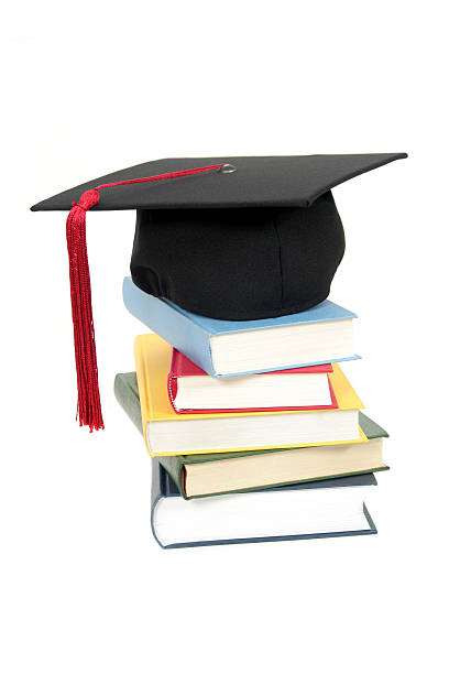 istock Graduation cap on top of books 140262100