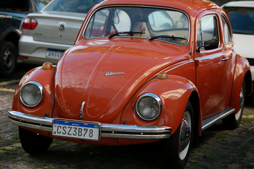 salvador, bahia, brazil - june 12, 2022: Volkswagen beetle vehicle is seen in a parking lot in the city of Salvador