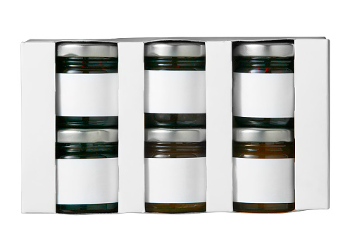 jam jar in paper packaging with white labels isolated on white.