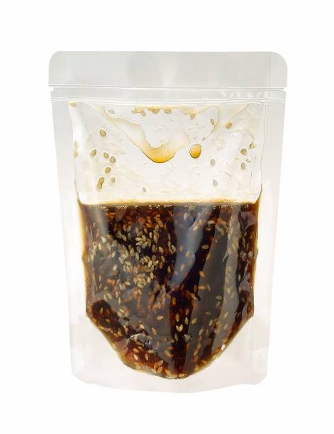 istock sesame soy wok sauce in plastic bag isolated on white 1402621512
