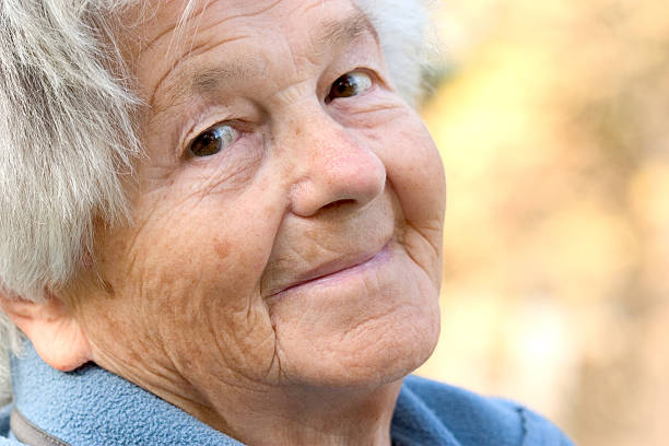 istock Elderly woman smiling at camera 140262200