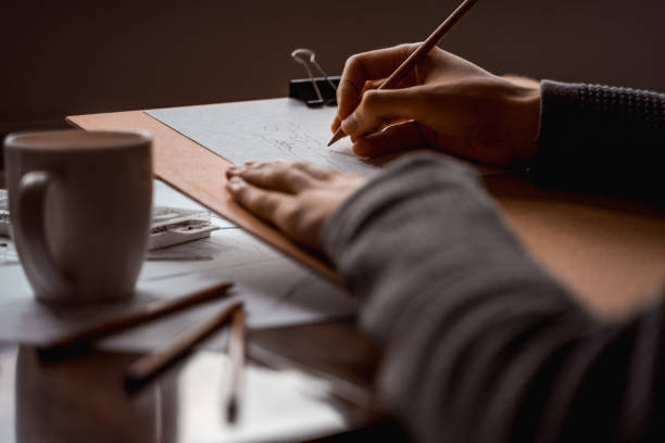 istock Artist drawing figure pencil sketches. 1402622711