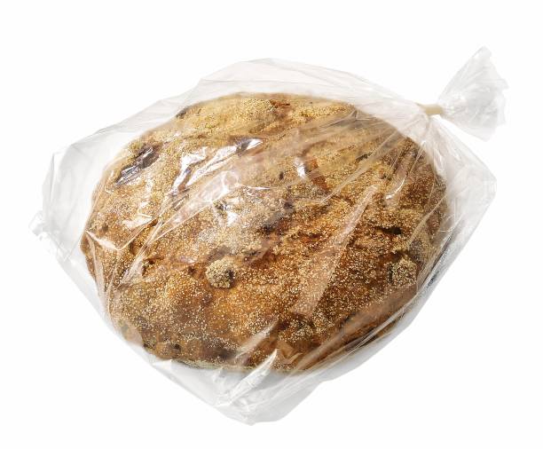 istock sweet bread baked with fruit in plastic wrap isolated on white 1402622872