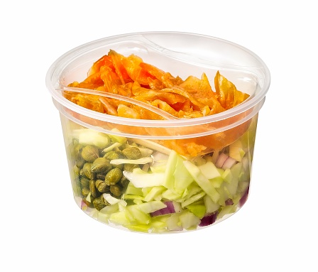 salad with salmon and caper in plastic container isolated on white