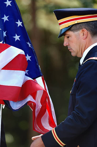 istock Soldier Helping Raise the Flag 140262324