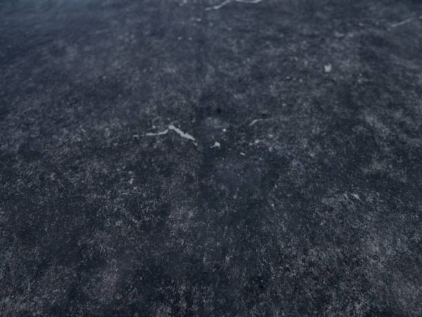 istock Black stone background. Top view. Free copy space 1402623505